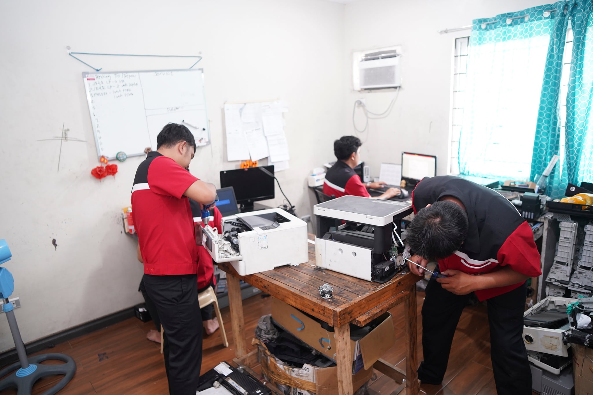 Technician working on printer 6